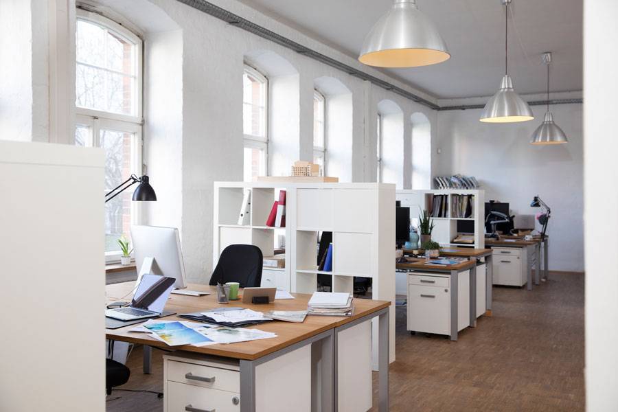 How often should office cleaning be done to ensure a clean and healthy work environment?